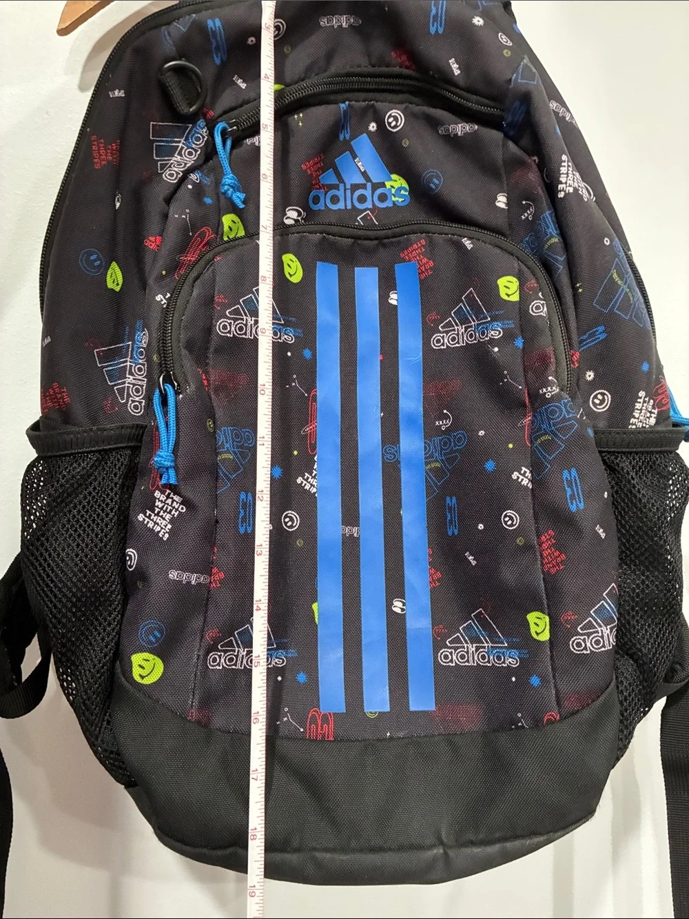 adidas Black Backpack with Bright Blue Stripes and Multicolor Accents